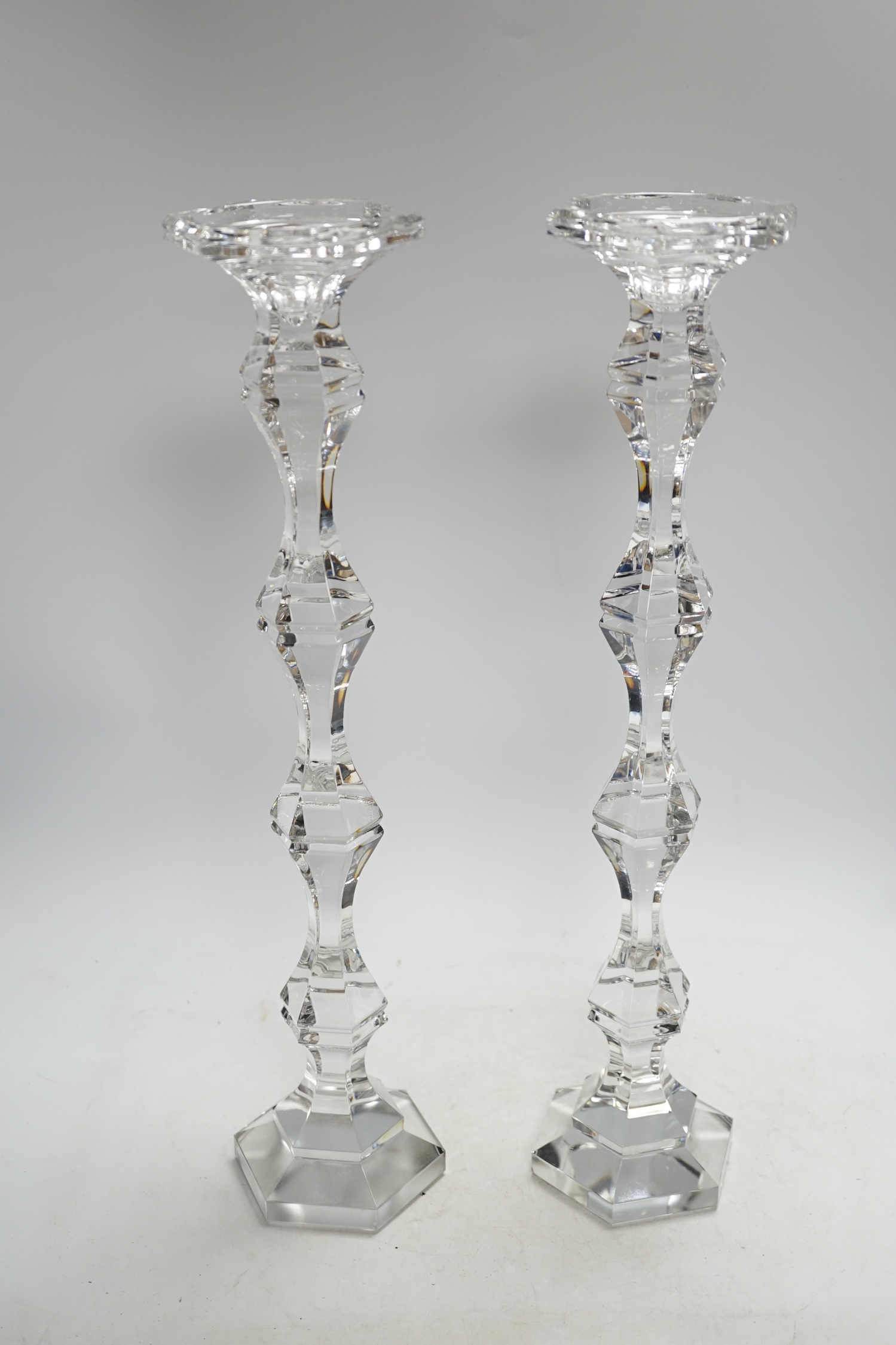 A pair of boxed tall Kenneth Turner glass candlesticks, 45.5cm